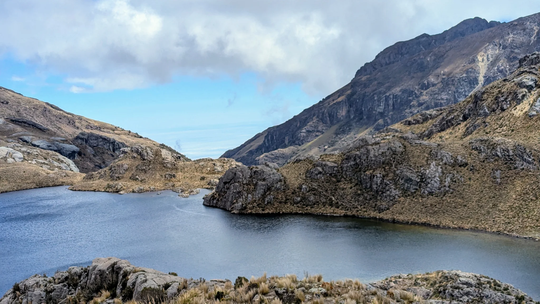 Rocky shores and a mountain wall