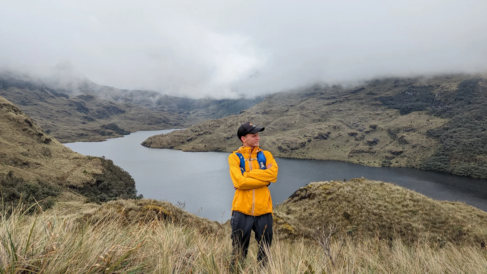Adult hiker or runner by lake.
