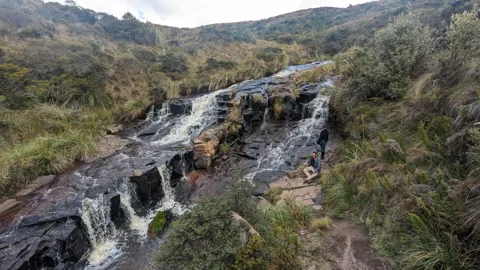 Stepped falls in a green valley