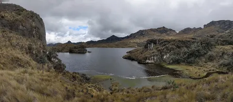 A highland lake between grassy shores. The water body is not securely named.