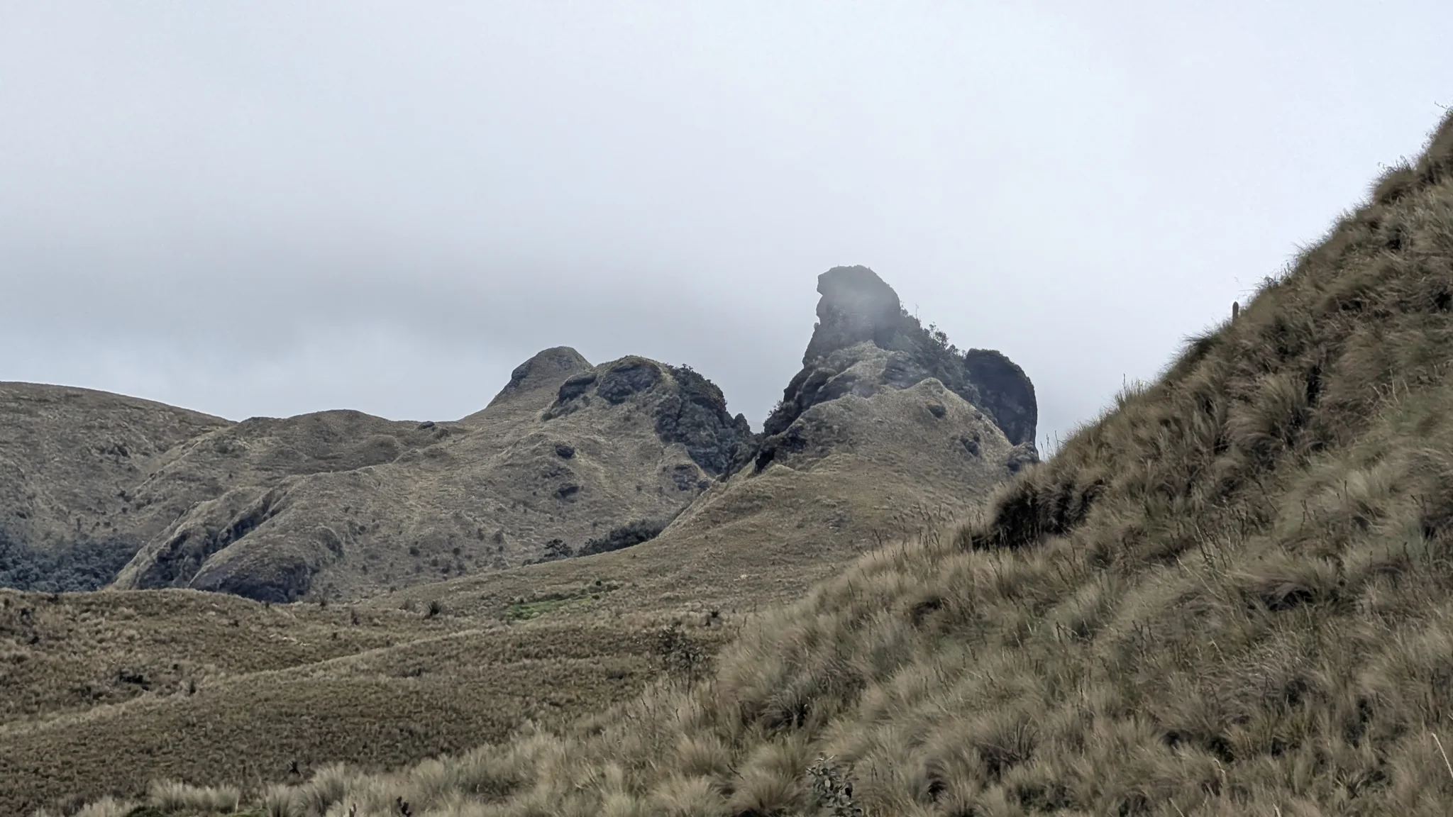 Twin rock towers in the mist