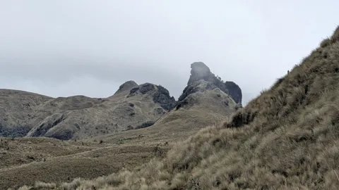 Twin rock towers in the mist