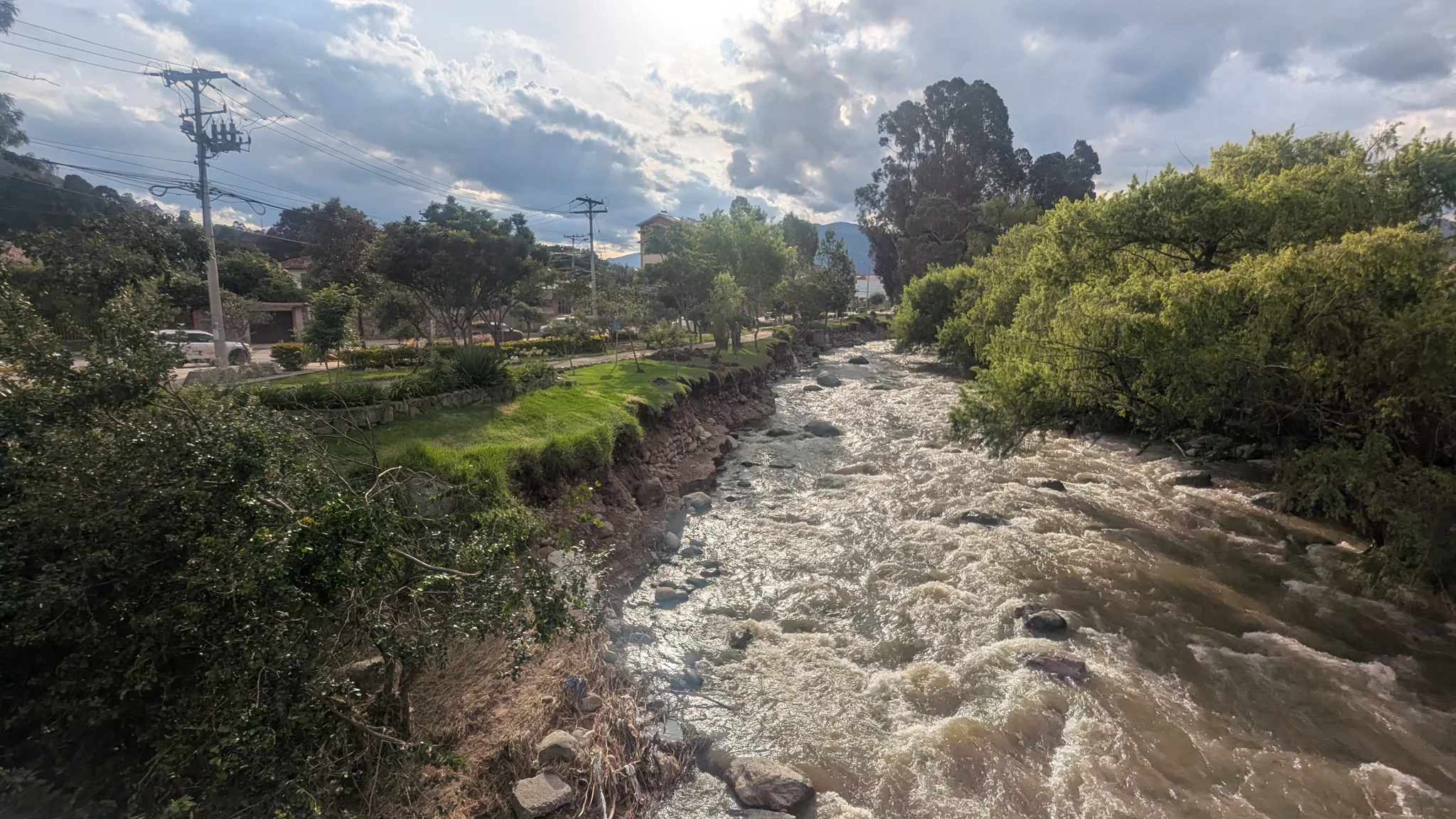 Rushing water among rounded boulders