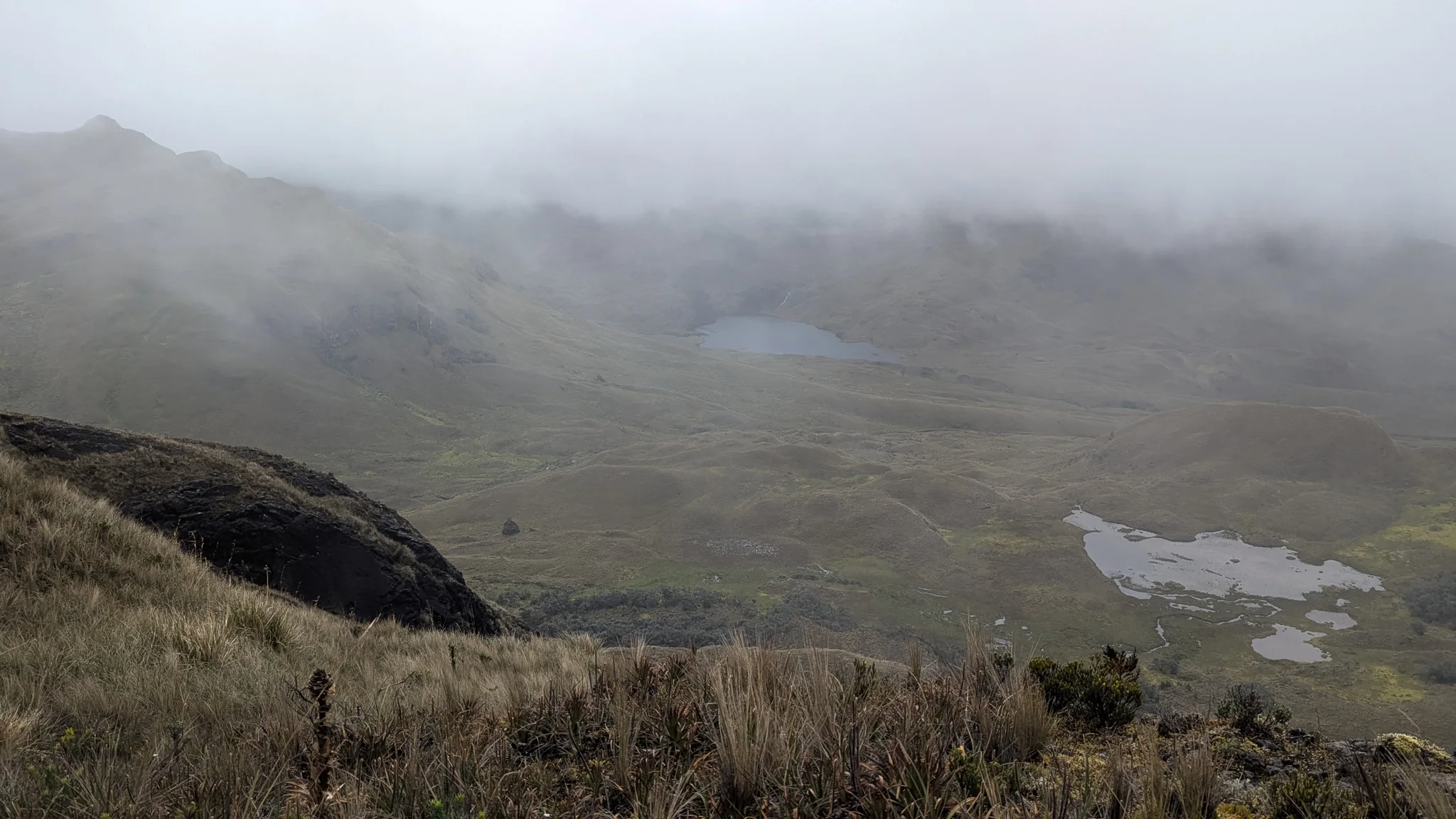 Foggy highland lakes. The water body is not securely named.