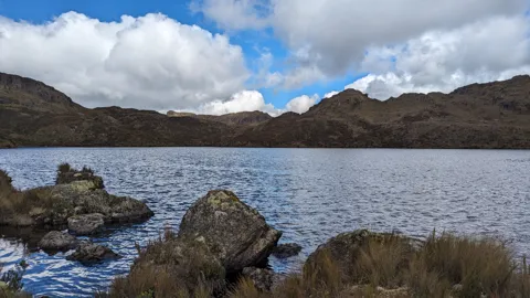 Highland lake with blue sky.